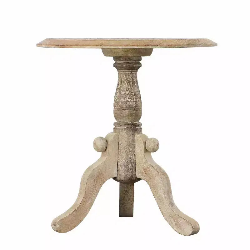 Table d'appoint en bois de manguier finement sculpté avec plateau rond et piétement piédestal