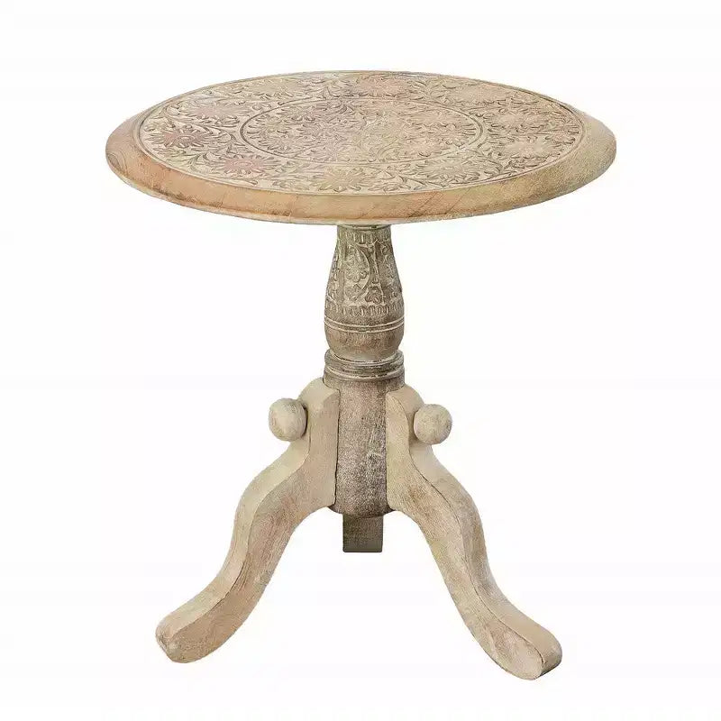 Table d'appoint en bois de manguier finement sculpté avec plateau rond et piétement piédestal