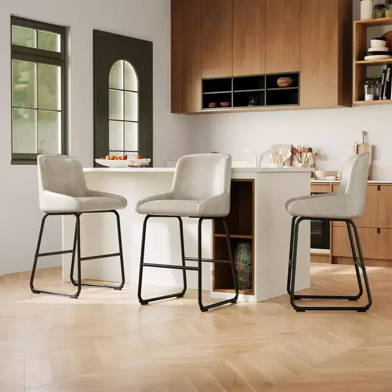 Tabourets de bar modernes en similicuir (lot de 4), chaises rembourrées sans accoudoirs avec dossier et repose-pieds, structure en métal, pour cuisine ou comptoir